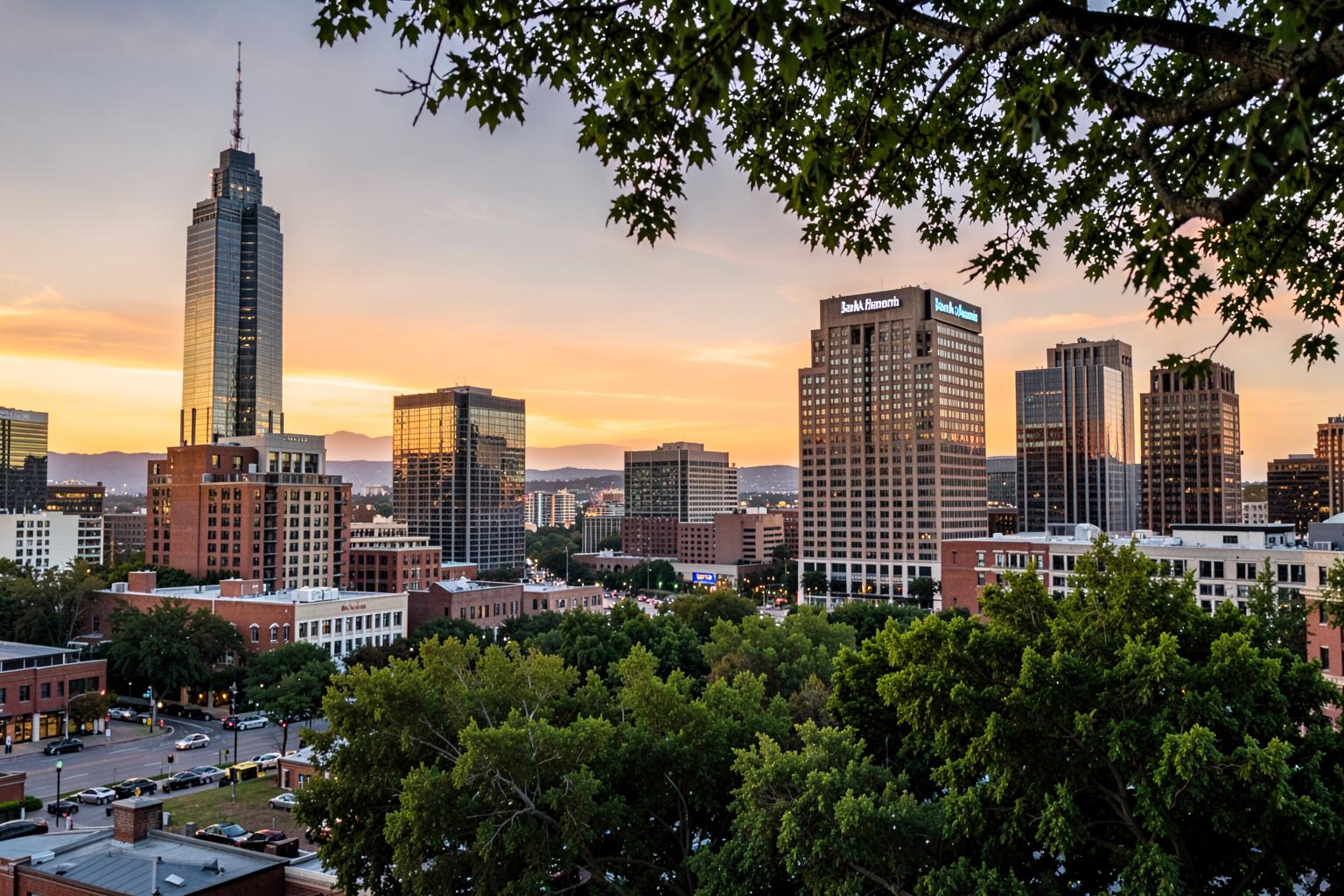Atlanta skyline at sunset above the city's tree canopy